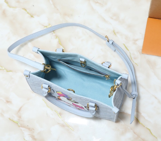 X TM Monogram Empreinte OnTheGo PM With Bijou Edition In Washed Blue