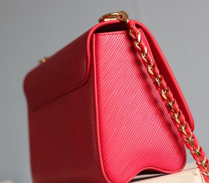 Louis Vuitton Epi Leather Twist MM Bag In Red