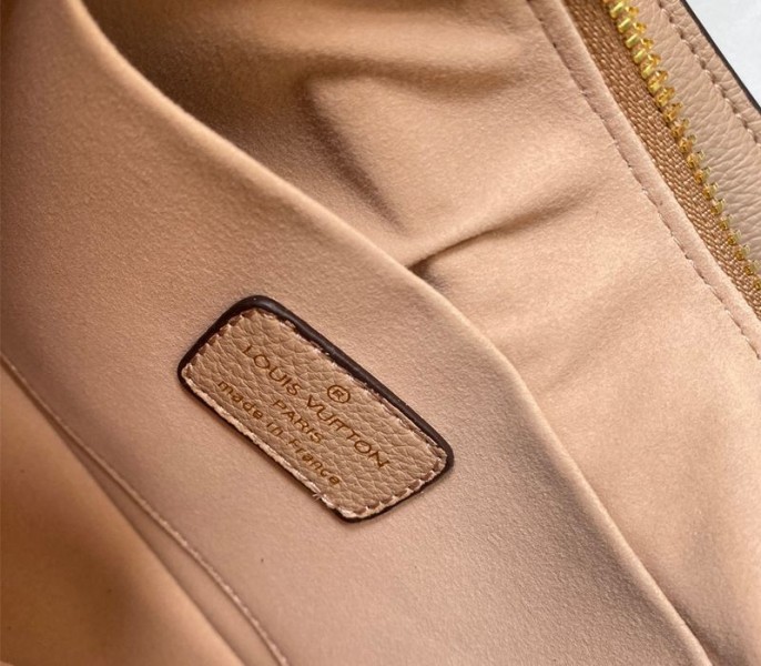 Louis Vuitton Monogram Empreinte Leather Bagatelle Mini Hobo In Beige