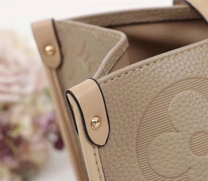 Louis Vuitton Monogram Empreinte Giant Onthego GM Tote In Beige