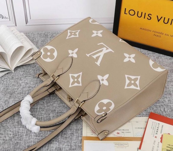 Louis Vuitton Monogram Empreinte OnTheGo MM Tote In Tourterelle Gray