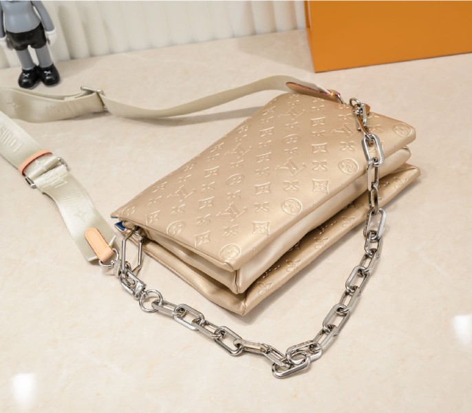 Louis Vuitton Coussin PM Bag In Light Gold With Jacquard Strap