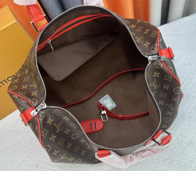 Louis Vuitton Monogram Macassar Canvas Keepall Bandouliere 50 In Red