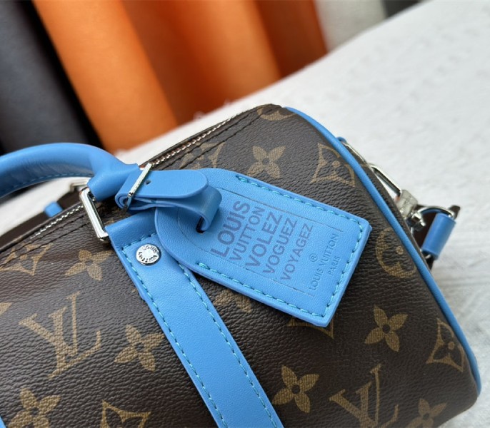 Louis Vuitton Monogram Macassar Canvas Keepall Bandouliere 25 In Gaston Blue
