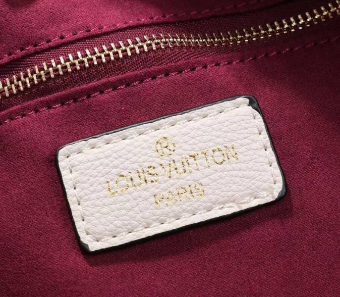 Louis Vuitton Monogram Empreinte Neverfull MM Tote In Cream