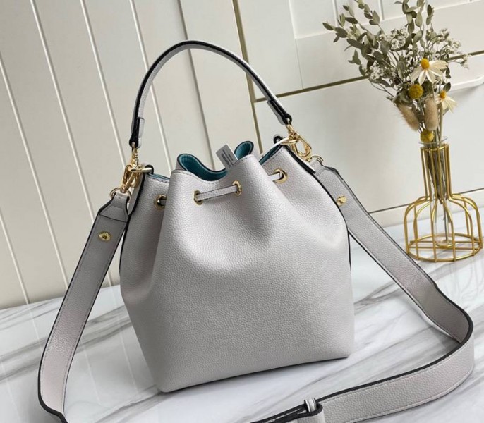 Louis Vuitton Lockme Bucket Bag In Greige
