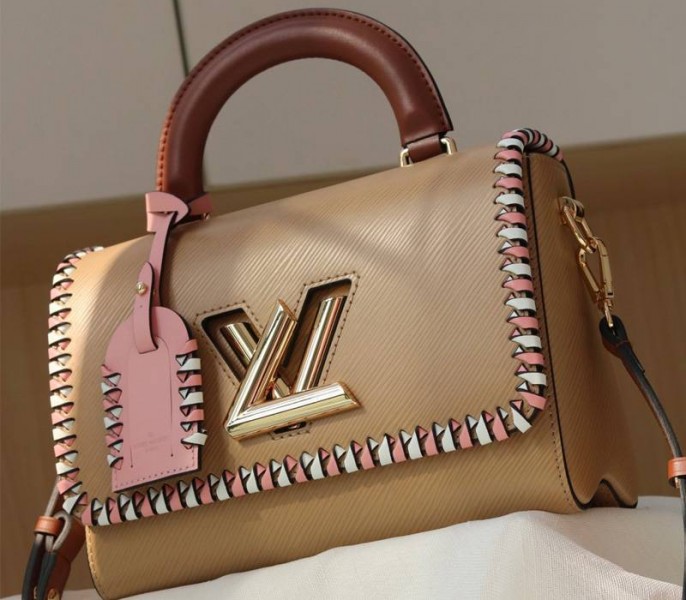 Louis Vuitton Epi Leather Twist MM Bag In Beige With Braided Edges Flap
