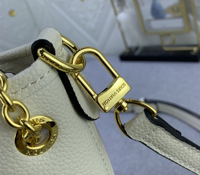 Louis Vuitton Monogram Empreinte Leather Bundle Bag In Cream