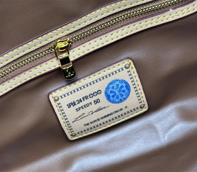 Louis Vuitton Speedy P9 Bandouliere 50 Bag In Pink Purple