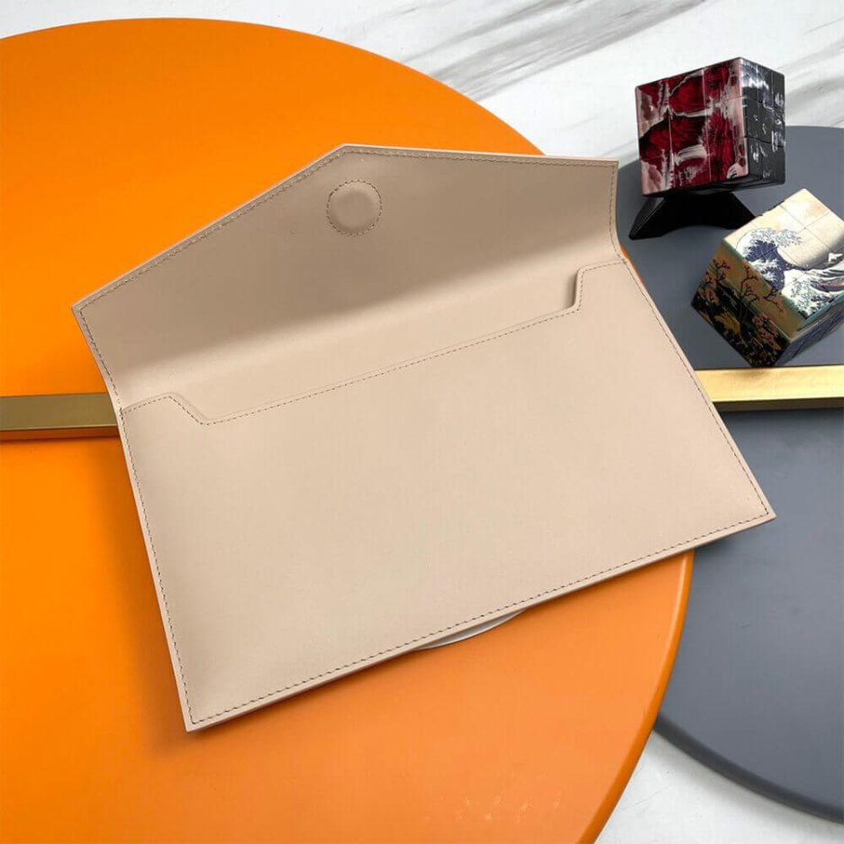 YSL UPTOWN POUCH IN GRAIN DE POUDRE EMBOSSED LEATHER