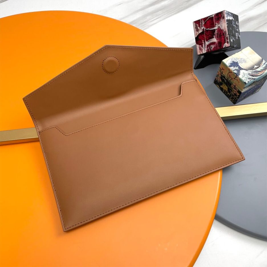 YSL UPTOWN POUCH IN GRAIN DE POUDRE EMBOSSED LEATHER