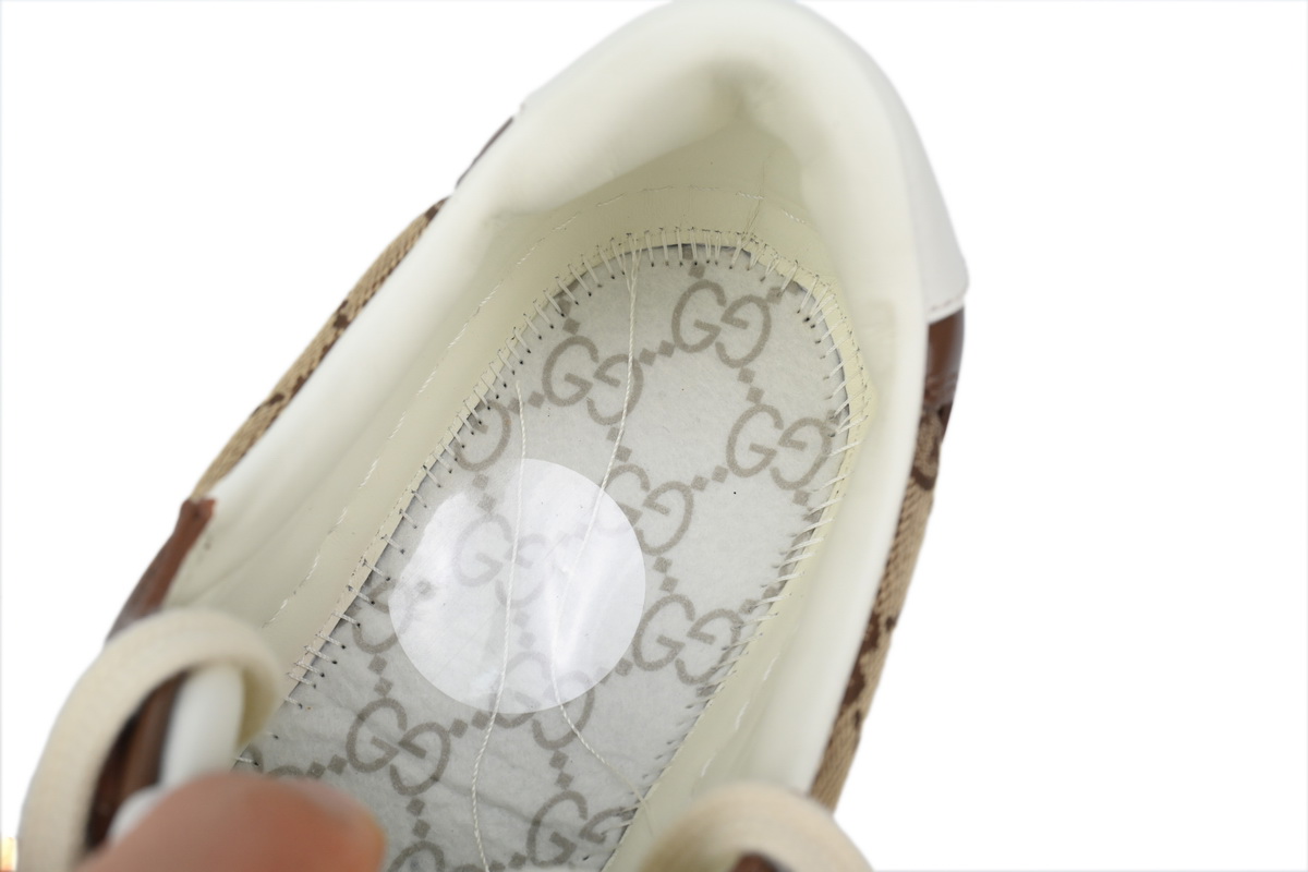 Gucci GG Embossed low-top Brown