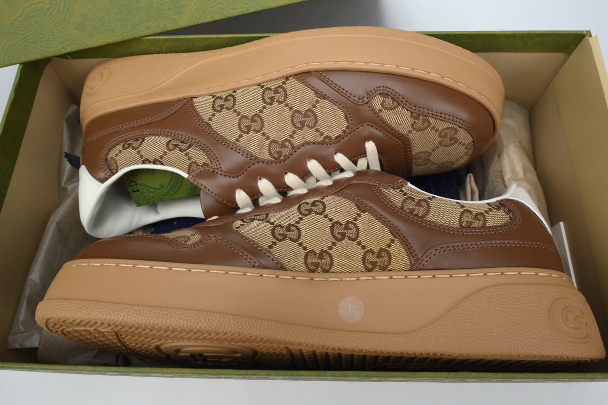 Gucci GG Embossed low-top Brown