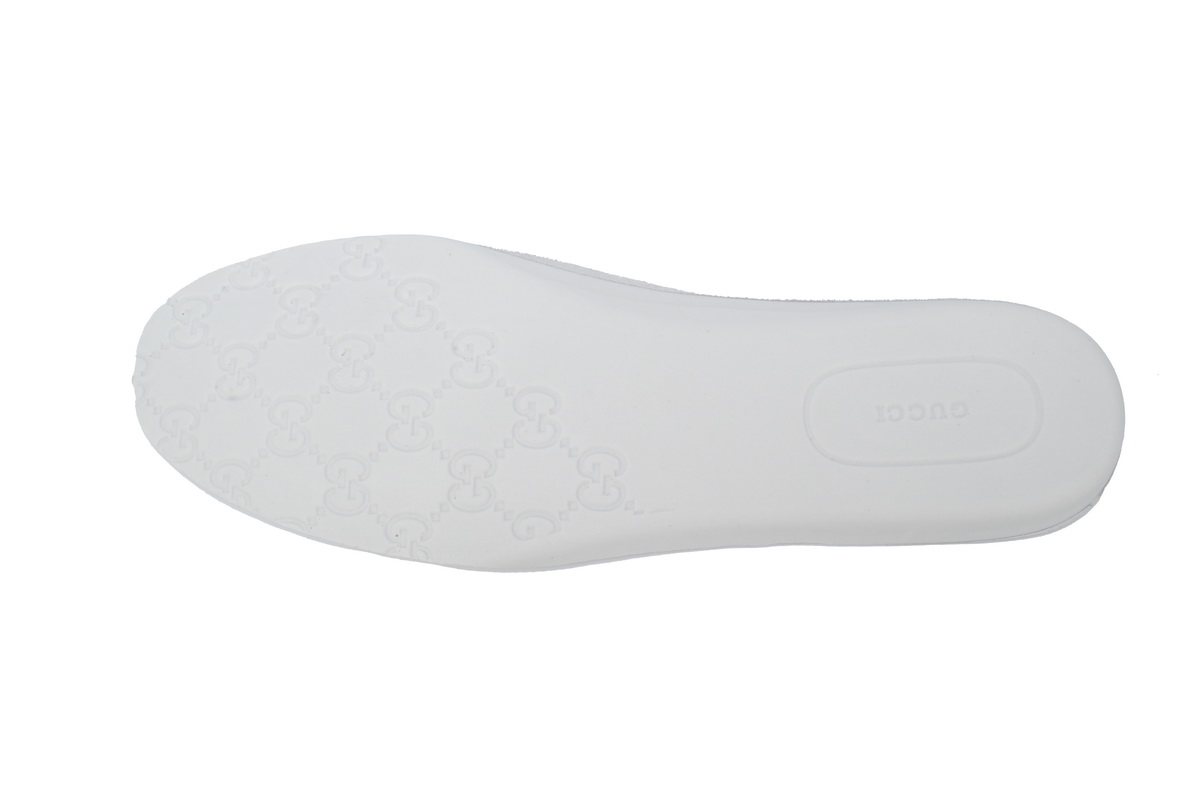 Gucci GG Embossed low-top Brown