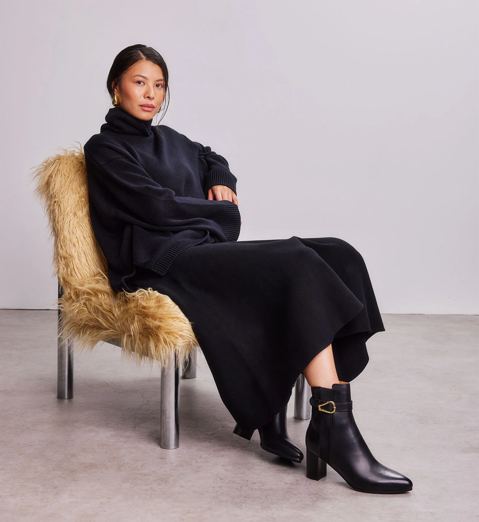 Snowcap Black Leather Heeled Boots